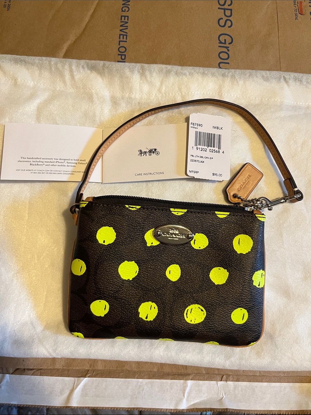 COACH Black Wristlet with Neon Yellow Polka Dot Print